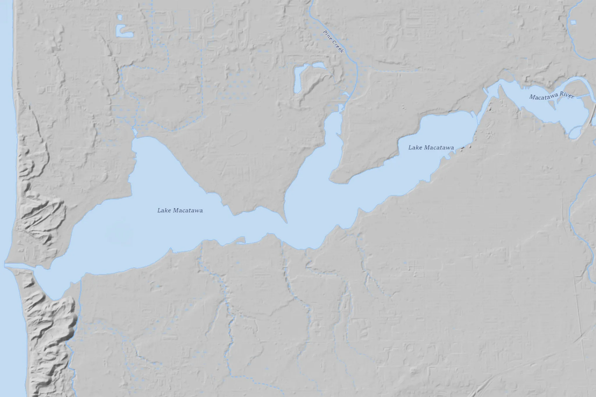 Relief-style elevation map of Lake Macatawa and surrounding shoreline areas.